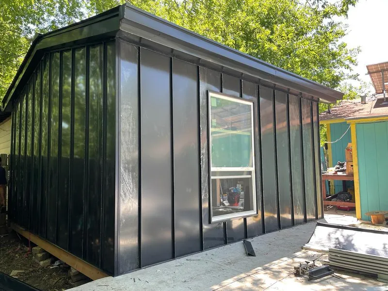 Black standing seam metal wall panels for Metal Roof Installation in Ridley