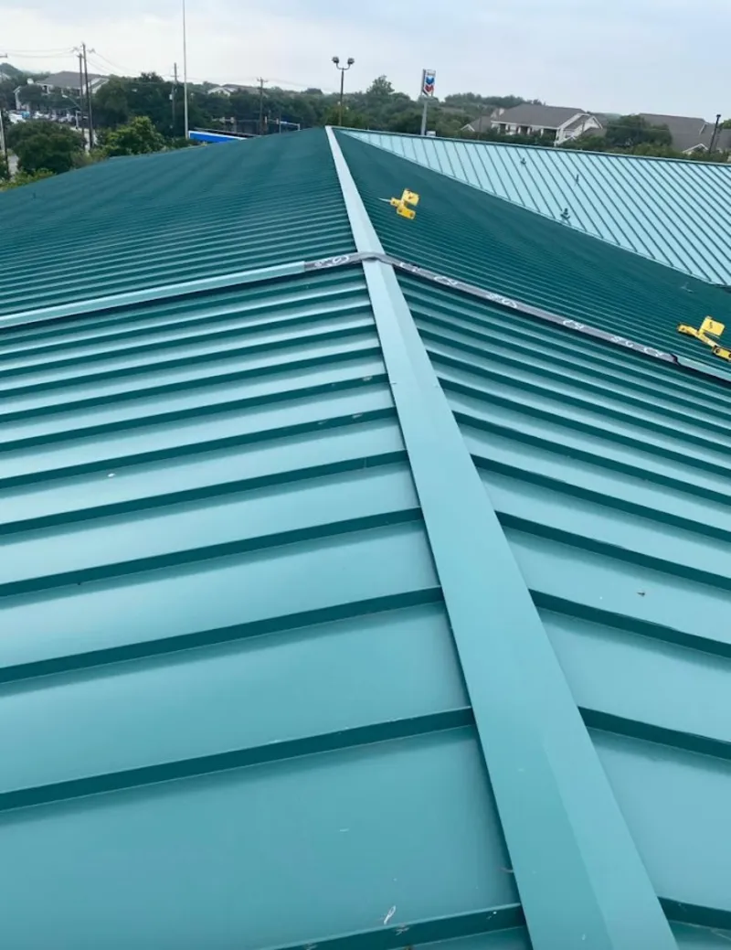 Green commercial metal roof ridge and valley for Metal Roof Repair in Ridley